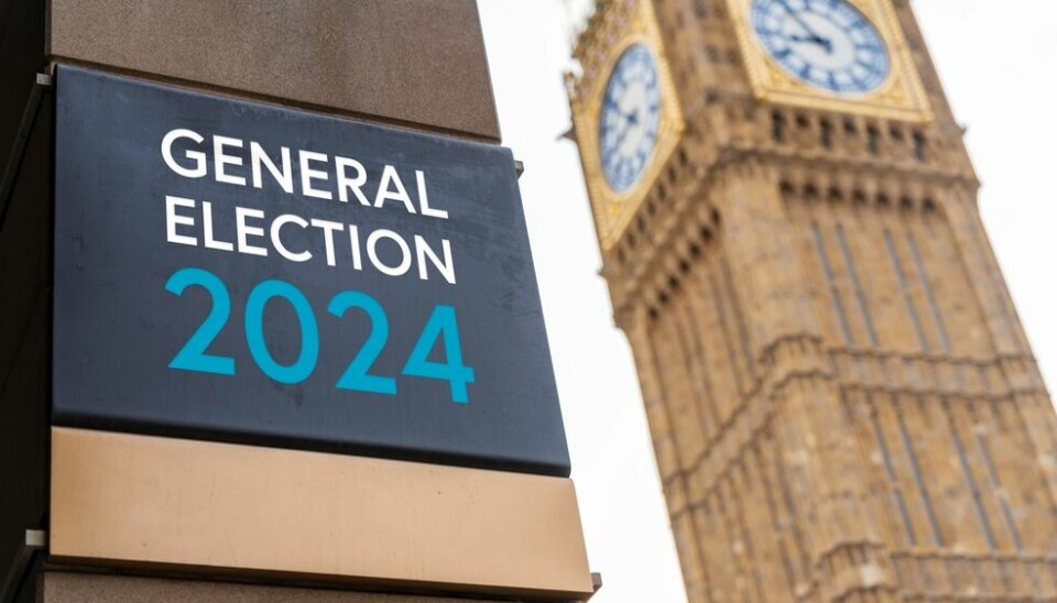 General election 2024 sign outside Palace of Westminster in London - how British voters in France can participate in uk election