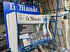French newspapers in rack with coverage of parliamentary election 2024