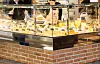A view of a cheese market at an indoor food market