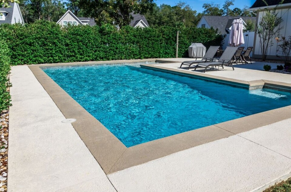 Ursula Page/Shutterstock A view of a private swimming pool at a home