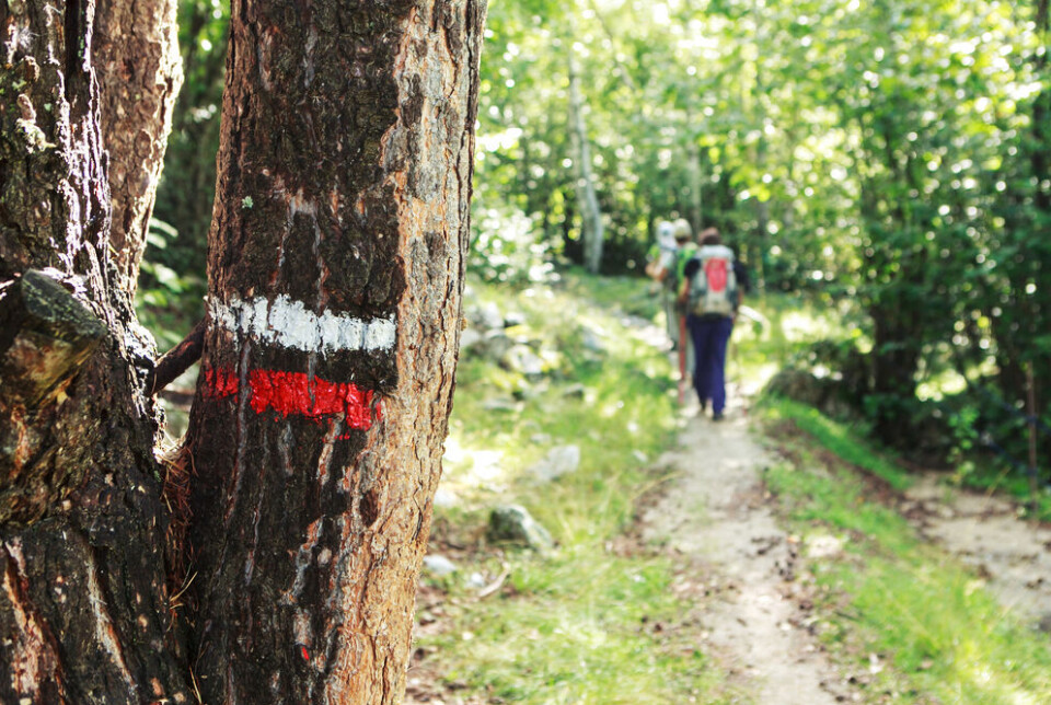 Copyright (c) 2015 wuthrich didier/Shutterstock. No use without permission. Hikers on a GR trail in France