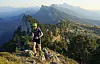 A view of a runner in impressive mountain scenery in France