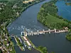 An aerial photo of Méricourt, showing the weir and lock on the Seine