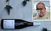 A bottle of Beaujolais villages with inset photo of producer Laurent Metge-Toppin