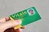 Hand holding a Carte Vitale