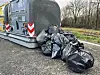 Black bin bags piled up at communal rubbish facilities in the Dordogne