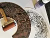 Lino-printed bird-themed fan