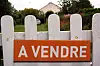 A view of a fence in France saying ‘A vendre (for sale)’