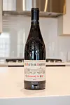 Bottle of Châteauneuf-du-Pape wine sitting on a kitchen counter