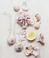 Garlic cloves with a slice of lemon