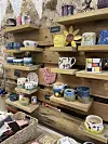 Pottery stacked on shelves