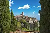 A hilltop village with church and stone houses