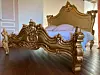 A grand golden bed frame