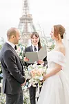 Couple getting married in front of Eiffel Tower