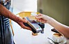 Hands,,Credit,Card,And,Waitress,With,Pos,At,Coffee,Shop