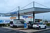 Vehicles refuelling at an E.Leclerc petrol station canopy in Vitry, France