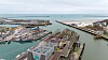 Aerial view of an abandoned port terminal, docks and seaside water in Boulogne, France.