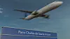 Commercial aircraft taking off above a Paris-Charles de Gaulle Airport sign.