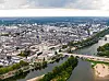Aerial view of Tours with the Napoleon Bridge and Wilson Bridge spanning the Loire River.
