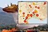 Canadair water bomber releasing water over a wildfire near Nice, France.
