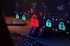 Glowing padlock icons hover above a laptop keyboard in a dark cyber security scene.
