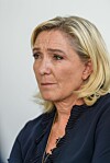 Portrait of Marine Le Pen wearing a dark jacket in Ollioules, France.