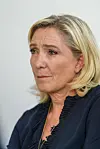 Portrait of Marine Le Pen wearing a dark jacket in Ollioules, France.